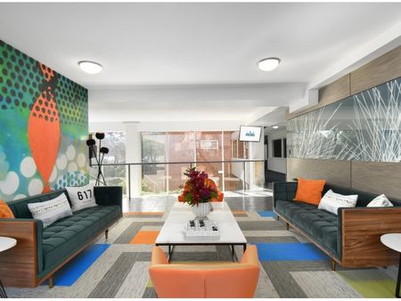 Long view of lobby at 100 Memorial Drive | Cambridge Apartments
