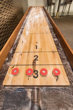 Shuffleboard Table in Game Room | The Southerly | Apartments in Towson, MD for Rent