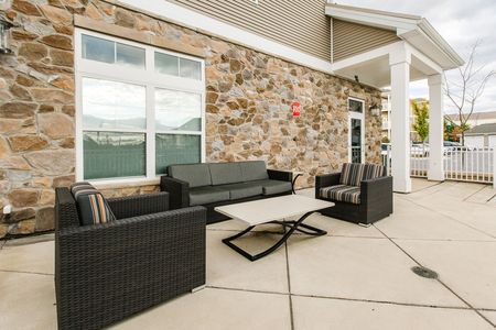 Outdoor patio - common area at The View at Mill Run Apartments in Owings Mills, MD