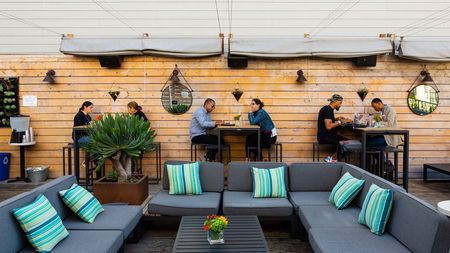 People eating on a patio