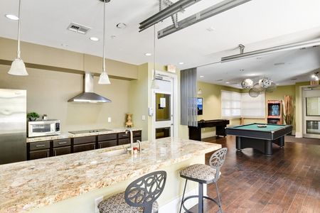 The District at SoCo interior game room and kitchen