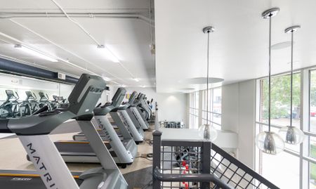 exercise bikes on the second floor of the fitness at the luxe on west call
