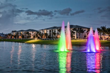 The Reserve at Coral Springs, exterior, dusk, buildings, rainbow fountains in pond