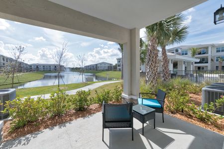 The Reserve at Vero Beach, exterior, covered patio, view of the pond, view of other apartment exteriors