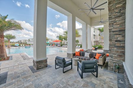 The Reserve at Coral Springs, exterior, sparkling blue swimming pool, clubhouse, lounge chairs, outdoor shaded seating