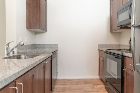 Upscale Kitchens with Shaker Style Wood Cabinets l Luxury Apartments for Rent l Fife, WA l Port Landing