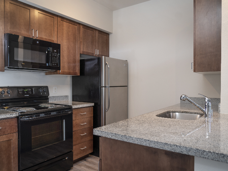 Upscale Kitchens with Shaker Style Wood Cabinets l Luxury Apartments for Rent l Fife, WA l Port Landing
