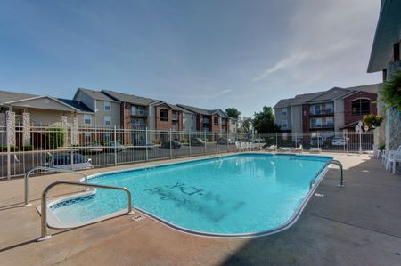 Battlefield Park Apartments amenity outdoor swimming pool overlooking the exterior buildings