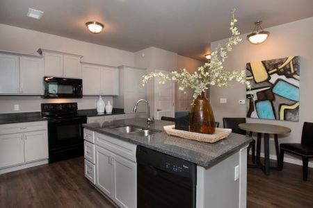 kitchen, granite counters, hardwood floors, Coryell Commons 55+ apartment homes