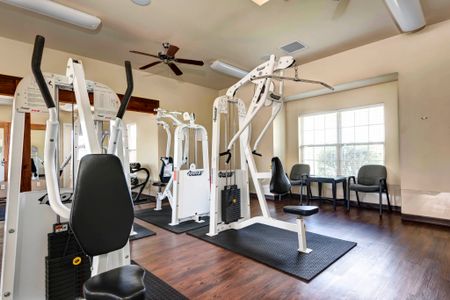 Coryell Courts fitness center with weight machines