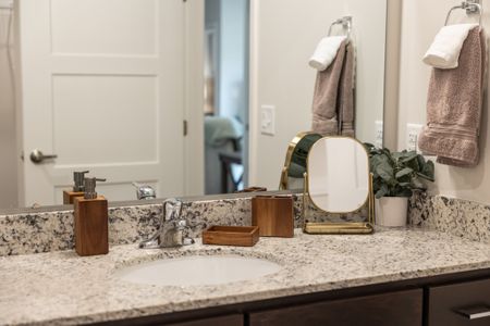 2 BEDROOM A FURNISHED PRIMARY BATHROOM