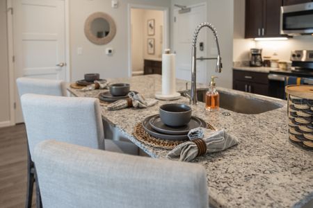 2 BEDROOM A FURNISHED KITCHEN