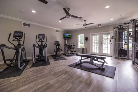 Apartment fitness center with cardio and cable equipment
