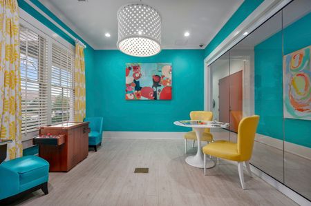 furnished game room with tables