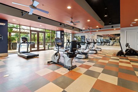 furnished fitness center qith equipment