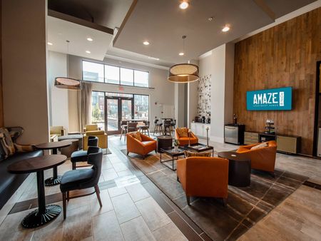 Clubhouse with seating and tvs