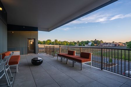 Exterior sky lounge with seating and view