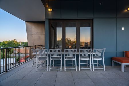 Exterior sky lounge with entertaining bar area