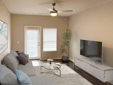 Furnished living room with ceiling fan