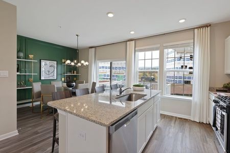 furnished kitchen and dining area of townhome