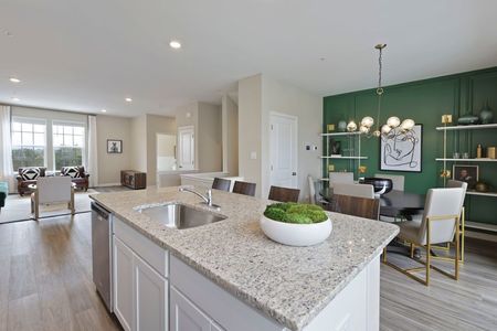 furnished kitchen and dining area of townhome