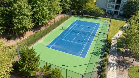 aerial shot of tennis court in daytime