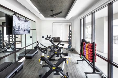 furnished fitness center with equipment