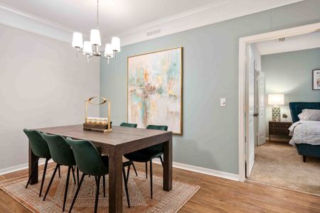 furnished kitchen and dining area of apartment home
