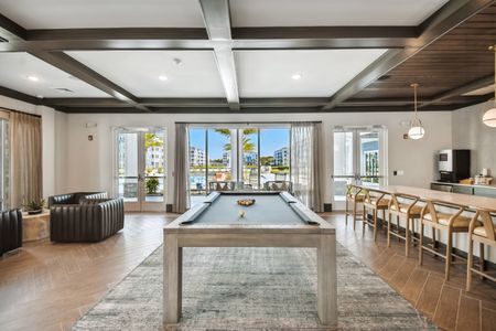 furnished clubhouse with decor and pool table and coffee bar