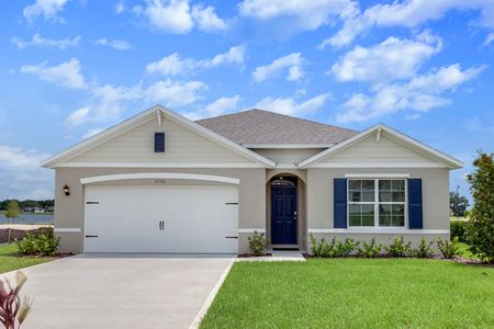 exterior single-family home with driveway on sunny day