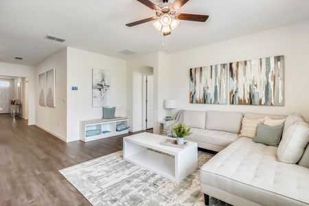furnished living area with sofa in home