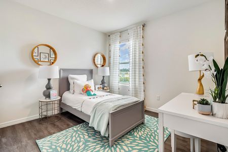 furnished home with bed and desk