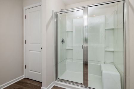 glass shower doors in bathroom in home