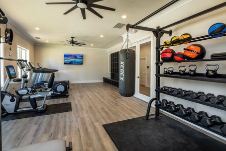 fitness center with punching bag and equipment