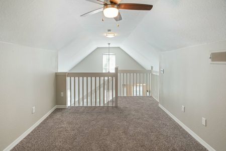 loft with carpet and ceiling fan