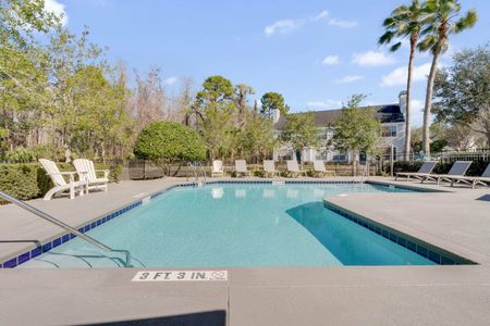 Orlando Luxury Apartments - Knightsbridge at Stoneybrook - Gated Swimming Pool With Sundeck And Lounge Chairs.