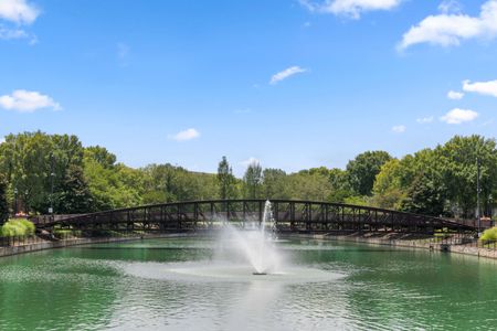 fountain feature in lake in daytime