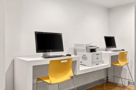 Community office space with computers and printer