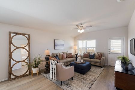 San Antonio, TX Homes For Rent - The Willows at Kendall Brook - Living Room with Wood-Style Plank Flooring, Stylish Decor, Ceiling Fan, and Large Window
