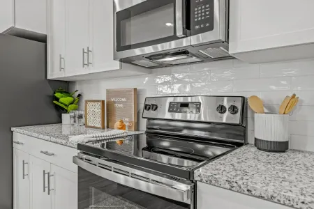 stainless steel stovetop with counter space in kitchen