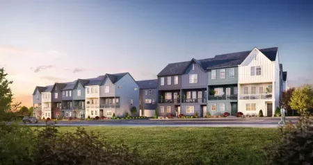 rendering of row of townhomes at dusk