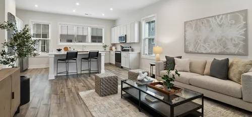 furnished living and kitchen area of home
