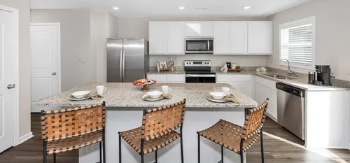 Furnished kitchen with large island