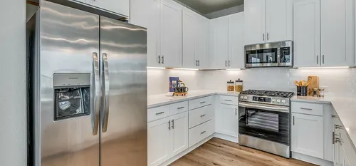 Furnished kitchen with stainless steel appliances