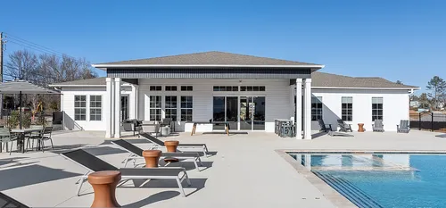 Swimming pool with lounging chairs