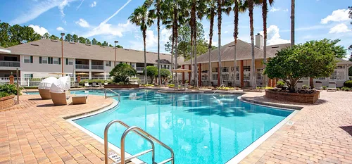 community pool with cabanas