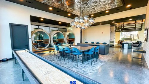 Upscale clubroom with shuffleboard