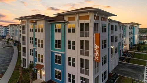 exterior apartment building at dusk