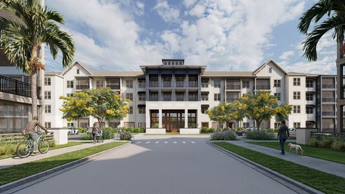 Contemporary apartment complex with lush landscaping and pedestrian-friendly walkways.