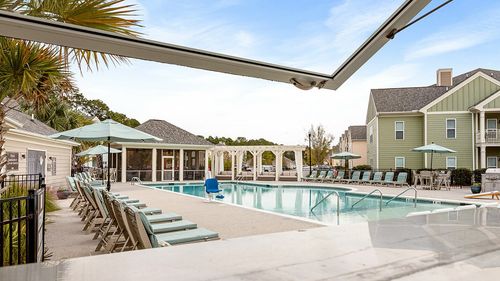 Pool with chairs and umbrellas